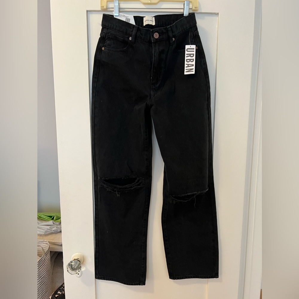 A brand Slouch Jeans with knee slits